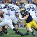 Michigan safety Jordan Kovacs runs after Northwestern quarterback Kain Colter during the third quarter at Michigan Stadium on Saturday. Melanie Maxwell I AnnArbor.com